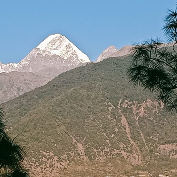 Scenic view of Ganesh Himal trek, snow-capped peaks, lush forests, and Himalayan trekking trails in Nepal