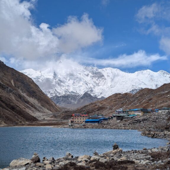 Scenic Gokyo Lakes view with clear blue water and high Himalayan peaks
