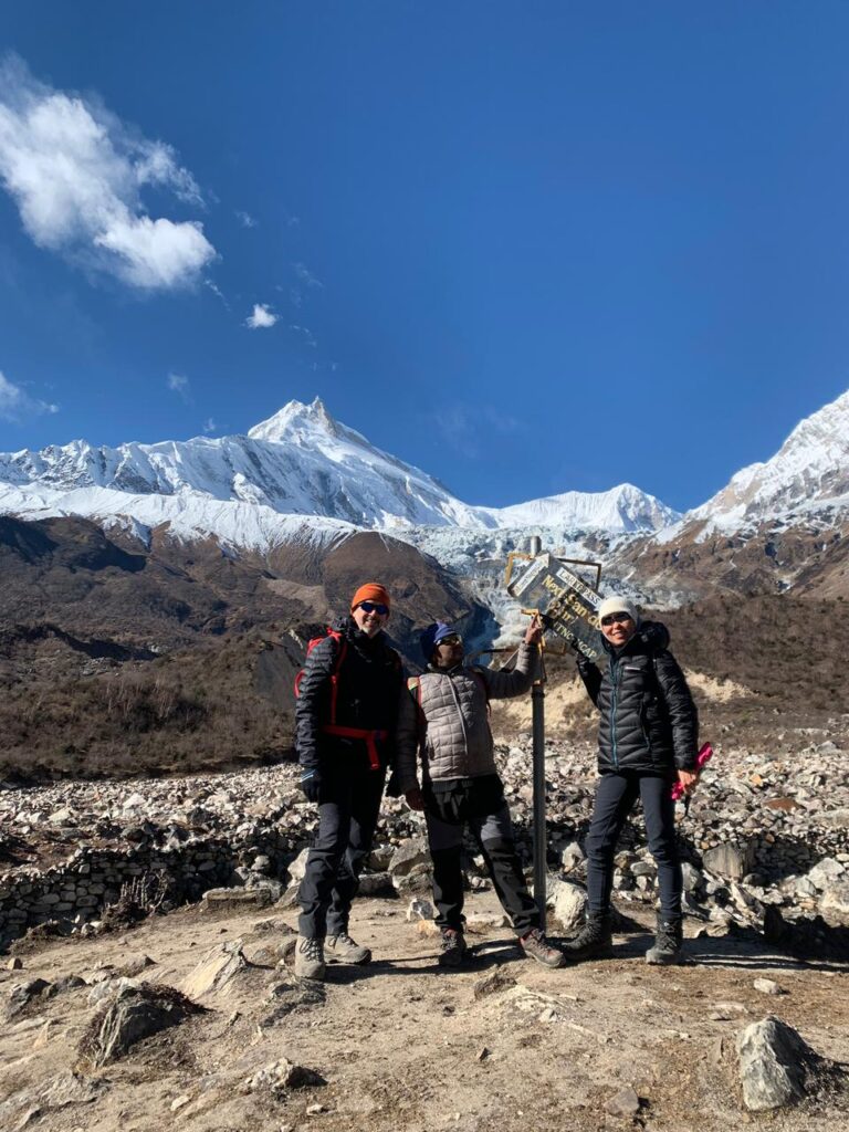 Trekkers resting during Manaslu Trek due to altitude sickness