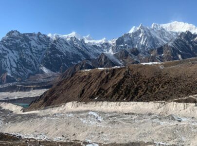 rekking to Larkya La Pass on the Manaslu Circuit Trek with local guide and porter