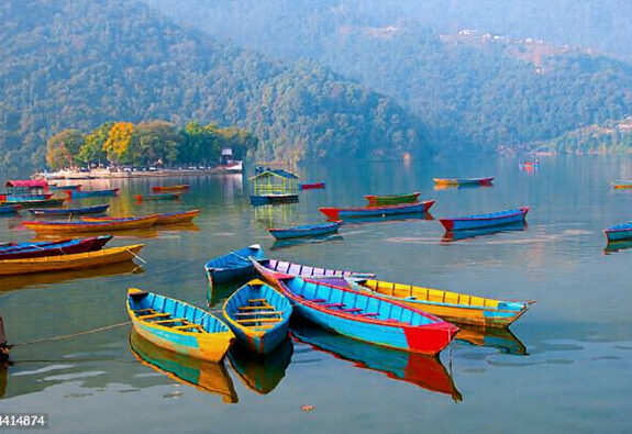 Phewa Lake boat ride with Annapurna mountains in the background, Pokhara, Nepal