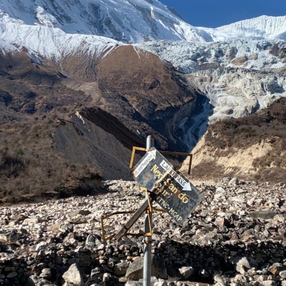 Scenic view of Manaslu Mountain with trekking trails through alpine landscape
